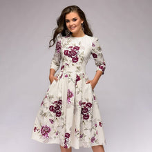 Load image into Gallery viewer, Retrozo – Ein edles, mittellanges Kleid - FashionWOLF