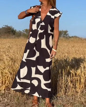 Load image into Gallery viewer, Modesta - Kleid mit V-Ausschnitt und Druck